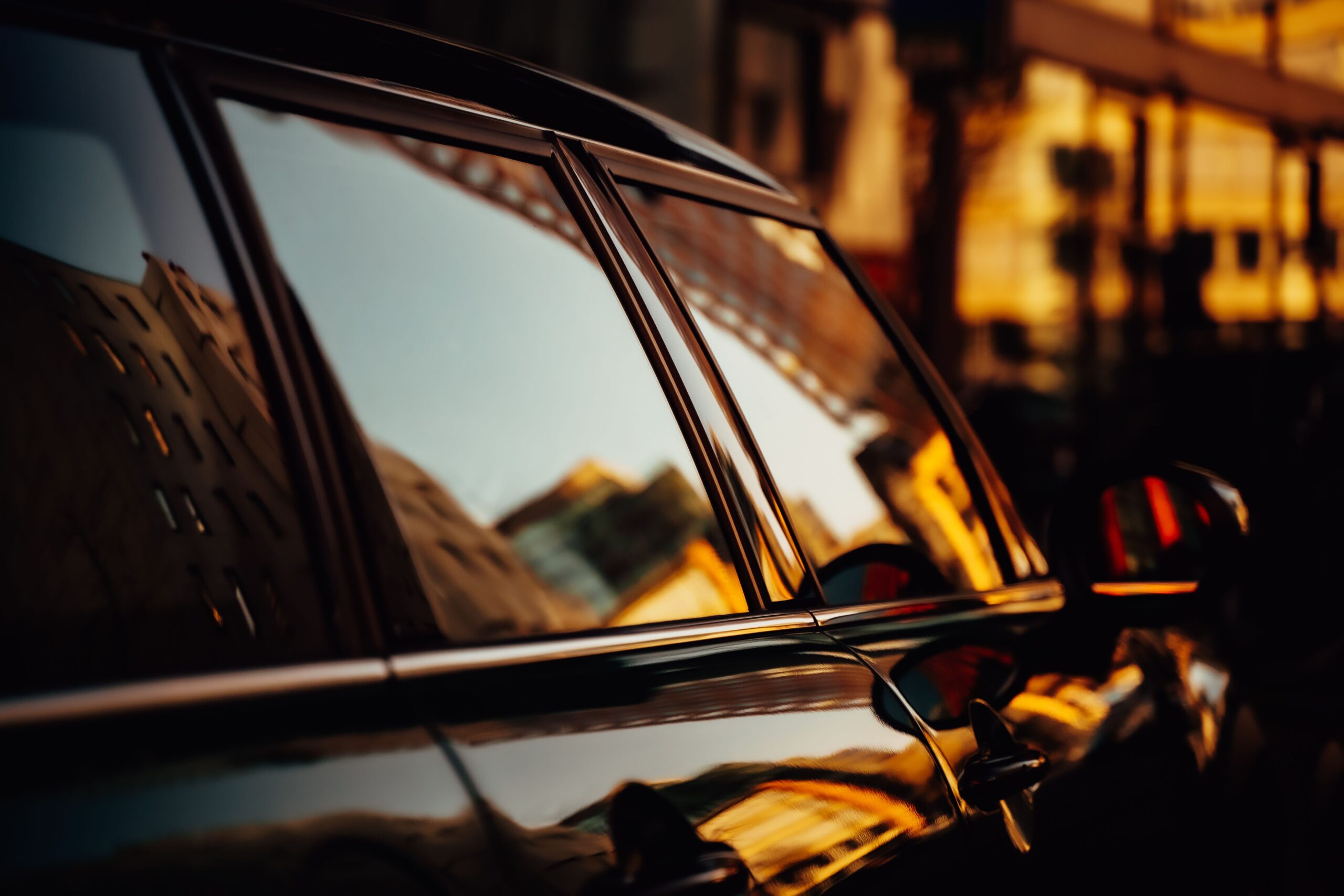 city reflection limousine window